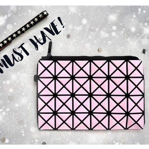 Cute pink wristlet/ clutch.